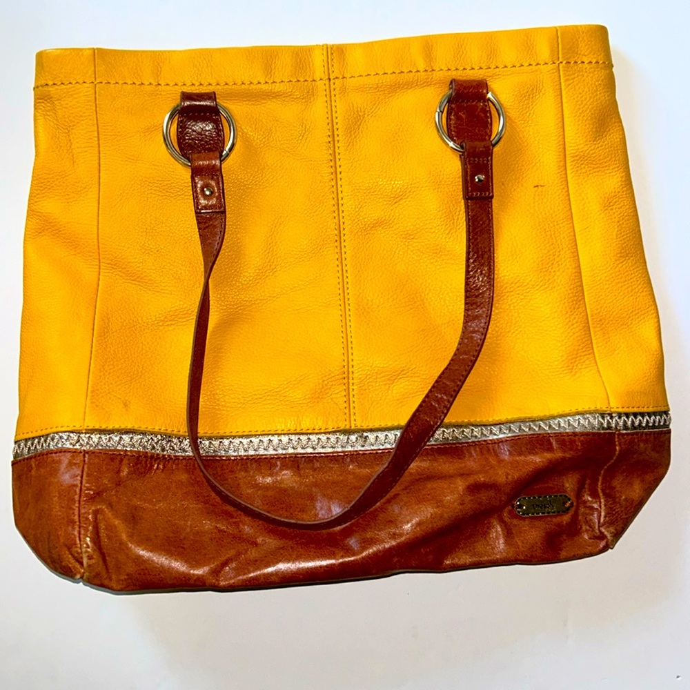 The Sak yellow and brown leather purse